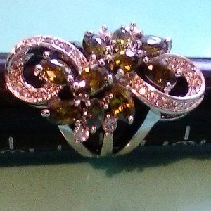 Posh Peridot Marquise cut Stone in WG Setting SZ 6